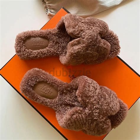 hermes fluffy slides.